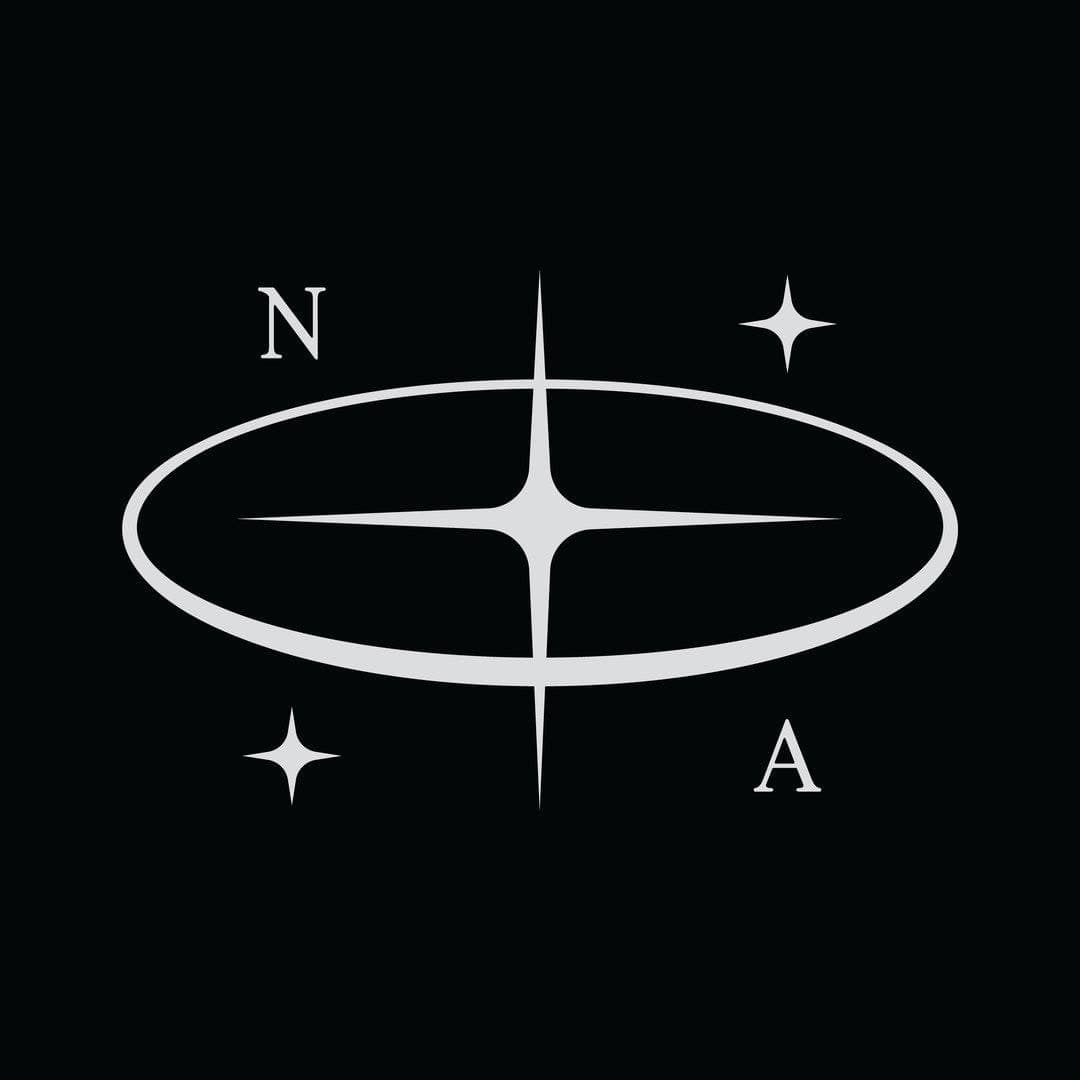 Nocturne Atelier logo: a four-pointed star inside an ellipse with the letters N and A